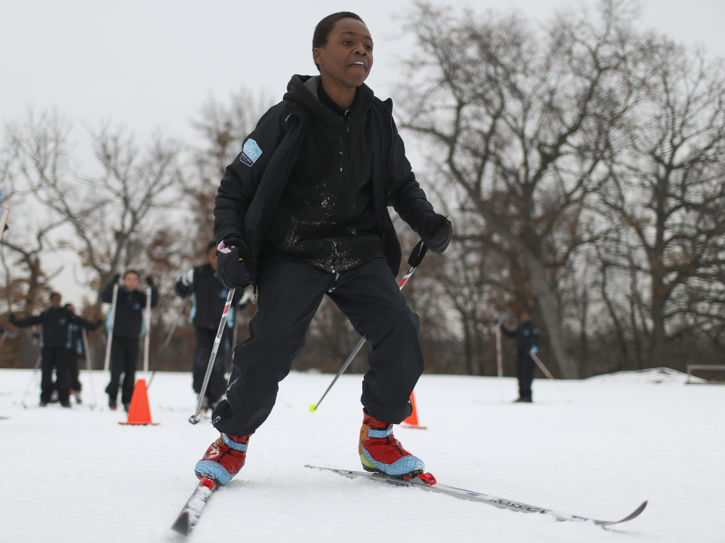 Child at cross-country skiing class